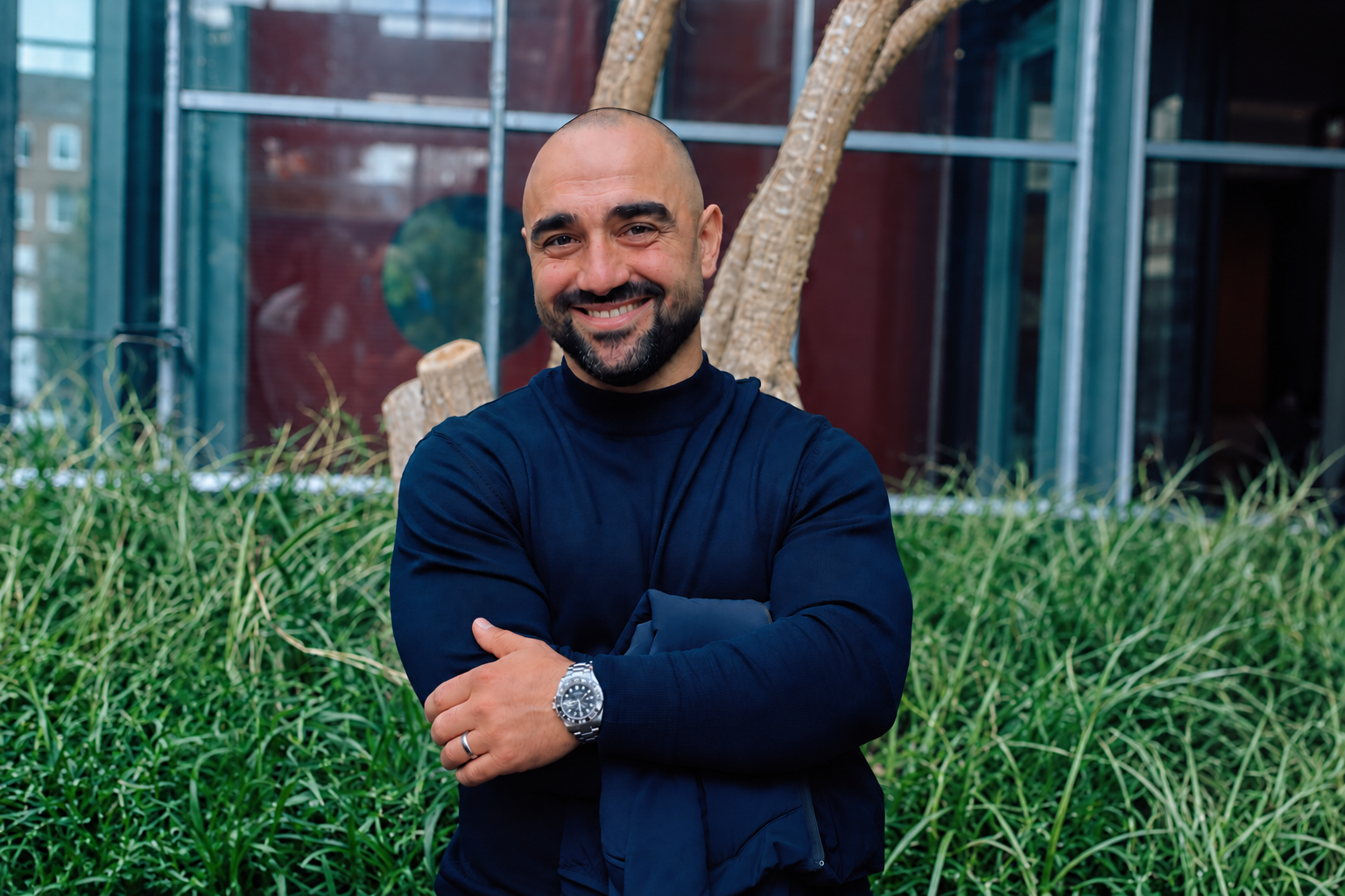 Mohamad Mosleh, founder of MM Execution Partner, standing outdoors with arms crossed